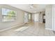 Bright and airy living room with tile floors and natural light streaming through large windows at 4635 20Th S Ave, St Petersburg, FL 33711