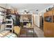 Kitchen featuring wooden cabinets, black appliances, and neutral flooring at 5410 Tangerine Dr, Zephyrhills, FL 33542