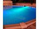 Illuminated in-ground pool at 5410 Tangerine Dr, Zephyrhills, FL 33542