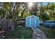 Storage shed with an attached covered patio space at 5410 Tangerine Dr, Zephyrhills, FL 33542