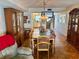 Dining room area with wooden furniture, parquet floors and decorative lighting at 5980 Shore S Blvd # 510, Gulfport, FL 33707