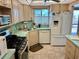 Bright kitchen with modern appliances and a view at 5980 Shore S Blvd # 510, Gulfport, FL 33707