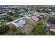 Aerial view of the neighborhood showcasing well-spaced homes, mature trees, and a peaceful residential setting at 6160 Van Dine St, Englewood, FL 34224