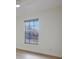 Bedroom with neutral walls, modern window treatments, and light wood-look floors at 6160 Van Dine St, Englewood, FL 34224