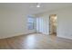 Spacious bedroom with neutral paint, closet, and an en-suite bathroom at 6160 Van Dine St, Englewood, FL 34224