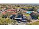 Aerial shot of the golf course, tennis, pickleball, shuffleboard, and pool at 8024 Feather Ct # D, Hudson, FL 34667