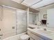 Bright bathroom with shower, tub, and modern vanity at 8024 Feather Ct # D, Hudson, FL 34667