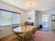 Cozy dining room featuring a round table set and a chandelier at 8024 Feather Ct # D, Hudson, FL 34667