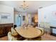 Open dining area with a table and chairs at 8024 Feather Ct # D, Hudson, FL 34667