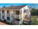 Condo with a private entrance, balconies, and well-maintained landscaping at 8024 Feather Ct # D, Hudson, FL 34667