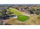 Scenic aerial view of a meticulously maintained golf course on a sunny day at 8024 Feather Ct # D, Hudson, FL 34667