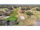 Beautiful golf course aerial shot showing greens, sand traps, pond and cart paths at 8024 Feather Ct # D, Hudson, FL 34667