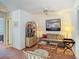 Inviting living room featuring a neutral sofa, woven furniture, and stylish decor at 8024 Feather Ct # D, Hudson, FL 34667