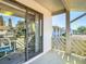 View from patio with a view of exterior and some furniture at 8024 Feather Ct # D, Hudson, FL 34667