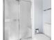 Bathroom with a glass-door shower at 8701 Braxton Dr, Hudson, FL 34667