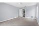 This bedroom is empty and staged at 8701 Braxton Dr, Hudson, FL 34667