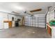Spacious two-car garage with ample storage space and an automatic door opener for easy access and security at 8701 Braxton Dr, Hudson, FL 34667