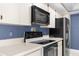 This is a close up on the stove and appliances in this kitchen at 8701 Braxton Dr, Hudson, FL 34667