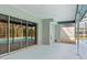 Spacious screened-in patio featuring access to the pool and backyard, perfect for outdoor living and entertaining at 8701 Braxton Dr, Hudson, FL 34667