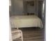 Bedroom features a bed and easy access to the outside porch at 9620 Pieces Of Eight Trl, Placida, FL 33946