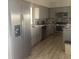 Updated kitchen features stainless steel appliances and plenty of counter space at 9620 Pieces Of Eight Trl, Placida, FL 33946