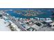 Eye-level view of a beautiful apartment community situated near a scenic body of water at 9895 1St E St # 5, Treasure Island, FL 33706