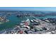 An eye-level view of a charming apartment community situated near a scenic body of water at 9895 1St E St # 5, Treasure Island, FL 33706