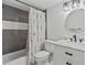 Updated bathroom features a marble vanity and tiled shower at 9895 1St E St # 5, Treasure Island, FL 33706