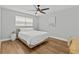 Bright bedroom with a ceiling fan and lots of natural light at 9895 1St E St # 5, Treasure Island, FL 33706