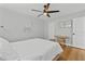 Bedroom featuring a ceiling fan and a closet at 9895 1St E St # 5, Treasure Island, FL 33706