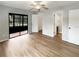 Bright main bedroom with new flooring and doors leading to closets and ensuite bathroom at 1003 Hammock Pine Blvd # 1003, Clearwater, FL 33761