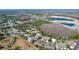 Aerial view of the community with beautiful lakes and mature Florida vegetation surrounding at 11212 Port Douglas Dr, New Port Richey, FL 34654