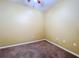 Cozy bedroom with neutral carpeting, fresh paint and electric outlets at 11212 Port Douglas Dr, New Port Richey, FL 34654