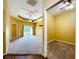 Bright living room featuring ceiling fan, neutral carpeting and sliding door access to the outdoors at 11212 Port Douglas Dr, New Port Richey, FL 34654