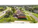 An aerial view of a home with a big back yard and custom brick paver patio at 13481 Pullman Dr, Spring Hill, FL 34609
