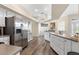 Well-lit kitchen with stainless steel appliances and ample counter space at 13481 Pullman Dr, Spring Hill, FL 34609
