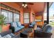 Cozy covered patio with comfortable seating, perfect for outdoor entertaining at 13481 Pullman Dr, Spring Hill, FL 34609