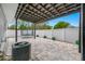 Outdoor space boasts a trampoline, a covered patio, and lush greenery, perfect for outdoor enjoyment at 1404 Wood Ave, Clearwater, FL 33755