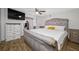 The spacious main bedroom features a comfortable bed and a walk-in closet at 1404 Wood Ave, Clearwater, FL 33755