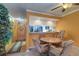 Comfortable dining area adjacent to the entry hall, with a view into the kitchen at 1411 Water View W Dr, Largo, FL 33771