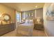 Stylishly decorated bedroom with coastal-themed décor, neutral walls, and recessed lighting at 14466 Pioneer Ridge Dr, Hudson, FL 34667