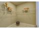 Walk-in closet space featuring marble floors, and wire shelving for clothing and accessories at 14466 Pioneer Ridge Dr, Hudson, FL 34667