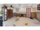 Unfinished room featuring bare walls and flooring with upper cabinets visible at 1859 Nevada Ne Ave, St Petersburg, FL 33703
