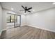 Cozy bedroom with sliding glass doors to the outside at 19029 Us Highway 19 N # 19C, Clearwater, FL 33764