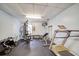 A well-equipped fitness center with machines, weights, and a television at 19029 Us Highway 19 N # 19C, Clearwater, FL 33764
