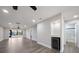 Open living room features recessed lights, fan, and wood grain flooring at 19029 Us Highway 19 N # 19C, Clearwater, FL 33764