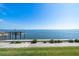 Enjoy scenic water views and a private dock from this home with mature landscaping at 19029 Us Highway 19 N # 19C, Clearwater, FL 33764