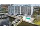 Waterfront condo boasts a pool and a marina, offering direct access to boating and water activities at 2 Adalia Ave # 602, Tampa, FL 33606
