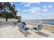 Outdoor patio area with comfortable seating and stunning waterfront views of the bay and city skyline at 2 Adalia Ave # 602, Tampa, FL 33606