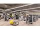 Spacious gym featuring modern equipment and ample natural light, perfect for a complete workout at 2218 Mayfield Palms Ln # 323, Sun City Center, FL 33573